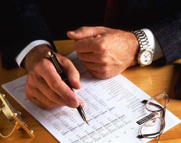 A businessman doing the paperwork