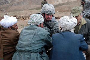 Herat Afghanistan Ð Brig. Gen. Michael A. Ryan, U.S. Forces Afghanistan, offers his condolences to families of those killed during an operation targeting insurgents near Herat province, Feb.17, 2009. The joint U.S. and Afghan investigation discovered weapons and ammunitions at the site.   Brig. Gen. Ryan also met with key village leaders to convey his commitment to security in the region and throughout Afghanistan.